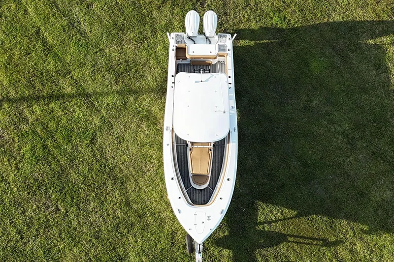  Yacht Photos Pics Overhead view of 2023 Seahunt 30 GameFish Coffin box boat on grass.