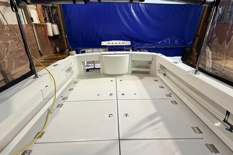 Kapalua Yacht Photos Pics 2013 Ocean Sport Roamer 33 boat interior with spacious deck and storage compartments.