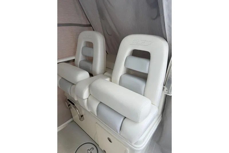  Yacht Photos Pics 2016 Boston Whaler 320 Outrage boat seats, featuring white cushioned design.