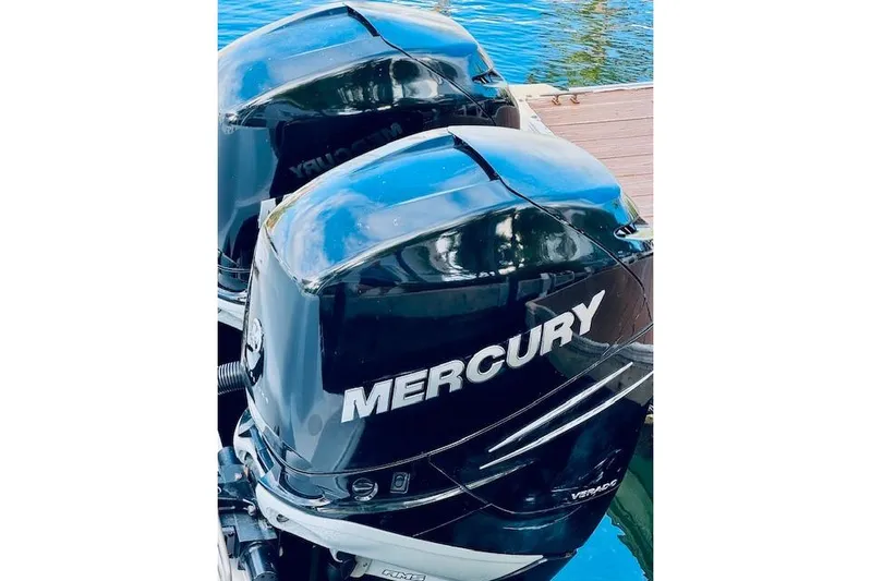  Yacht Photos Pics Twin Mercury outboard engines on a 2016 Boston Whaler 320 Outrage boat.