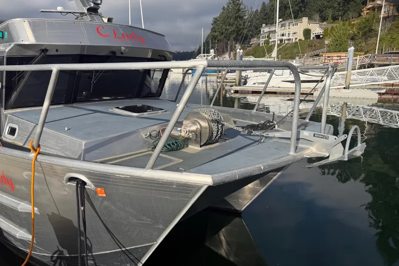 C Lady Yacht Photos Pics 2020 Armstrong Marine 35 boat docked in a marina, featuring a sturdy metal design.
