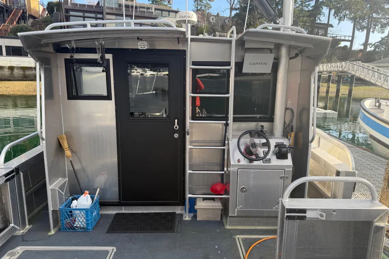 C Lady Yacht Photos Pics 2020 Armstrong Marine 35 boat interior with steering wheel and equipment.