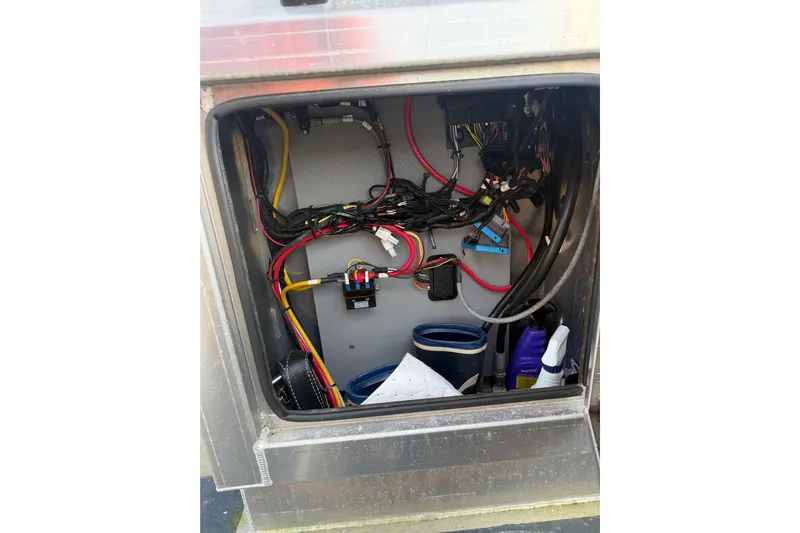 C Lady Yacht Photos Pics Electrical compartment of a 2020 Armstrong Marine 35 boat with wiring and maintenance supplies.