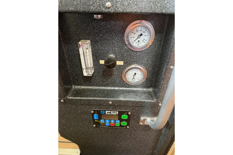 C Lady Yacht Photos Pics Control panel of a 2020 Armstrong Marine 35 boat with gauges and buttons.