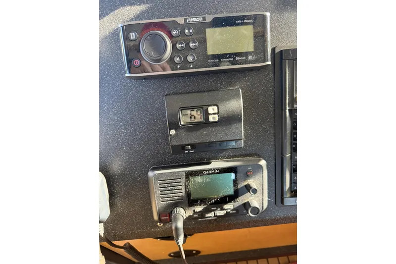 C Lady Yacht Photos Pics Control panel of a 2020 Armstrong Marine 35 with audio and navigation equipment.