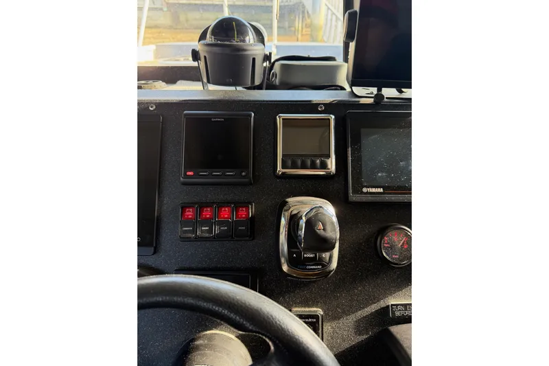 C Lady Yacht Photos Pics Control panel of a 2020 Armstrong Marine 35 boat with navigation and control systems.