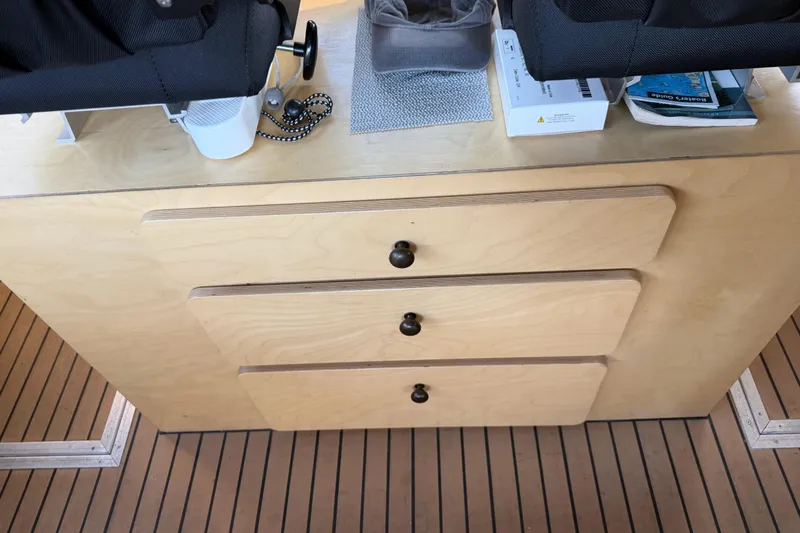 C Lady Yacht Photos Pics Interior of 2020 Armstrong Marine 35 with wooden drawers and seating.