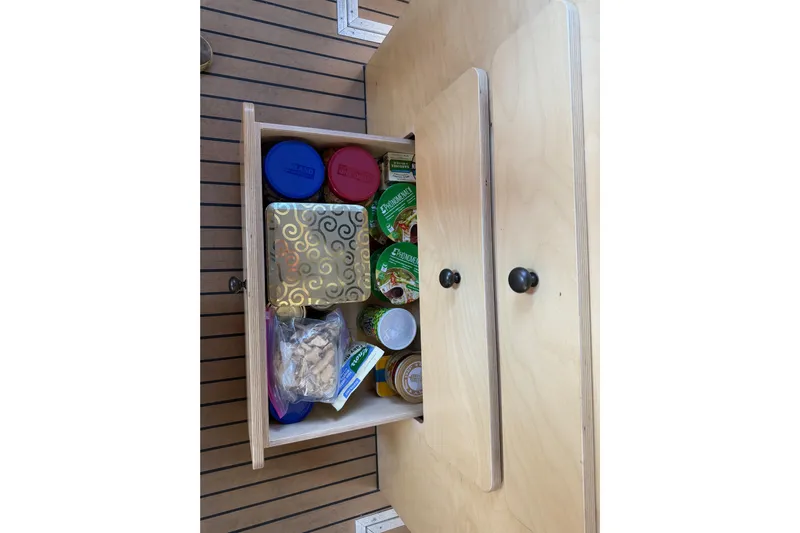 C Lady Yacht Photos Pics Drawer with assorted food items on Armstrong Marine 35, 2020 model boat.