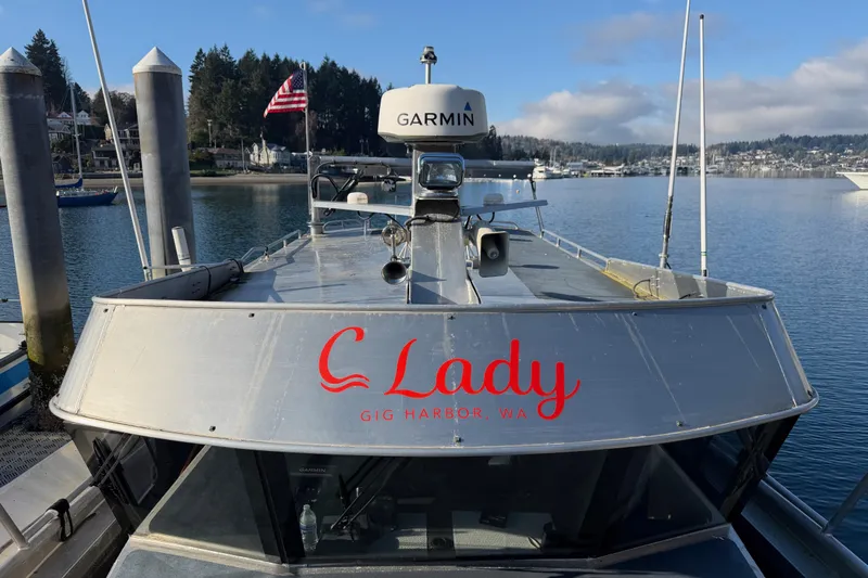 C Lady Yacht Photos Pics 2020 Armstrong Marine 35 boat docked in Gig Harbor, WA with American flag.