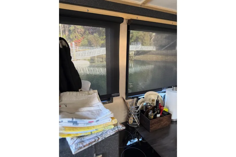 C Lady Yacht Photos Pics Interior of 2020 Armstrong Marine 35 boat with kitchen essentials and window view.