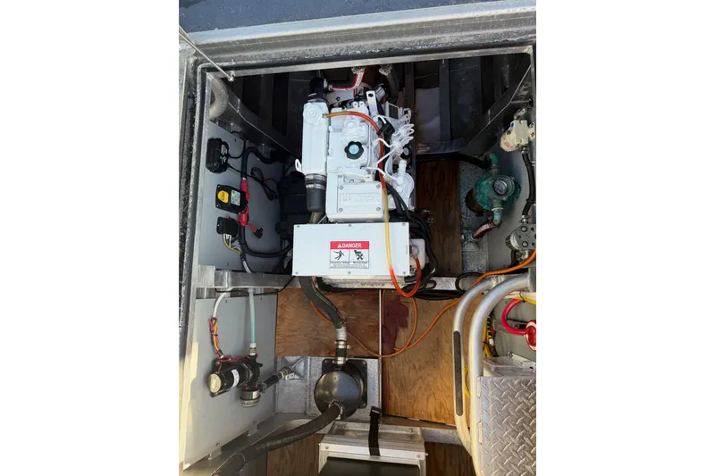 C Lady Yacht Photos Pics Engine compartment of a 2020 Armstrong Marine 35 boat, showcasing mechanical components.