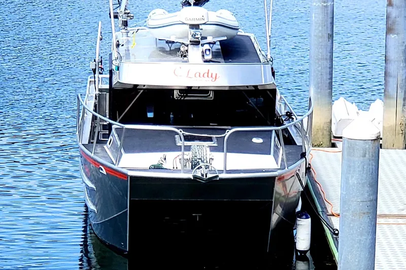 C Lady Yacht Photos Pics 2020 Armstrong Marine 35 boat docked at marina with calm water.