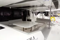 Leopard 50 yacht 2020 model with spacious outdoor seating and dining area, named Voila.