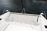 Leopard 50 catamaran 2020 model with netted trampoline deck on calm water.