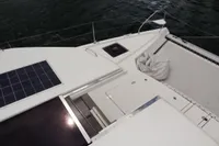Leopard 50 catamaran deck with solar panel, netting, and water view, 2020 model.