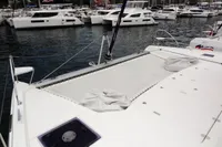 Leopard 50 catamaran (2020) docked in a marina with other boats.