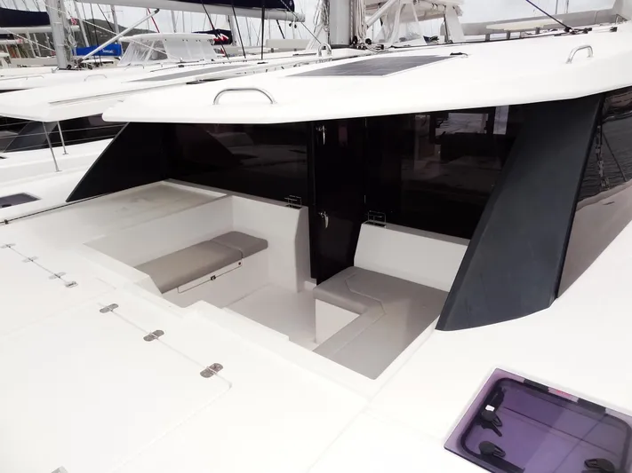Voila Yacht Photos Pics Leopard 50 catamaran 2020 model, spacious cockpit seating area, modern design.