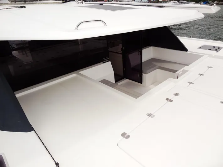 Voila Yacht Photos Pics Leopard 50 yacht 2020 model, spacious deck area with steps leading to interior.