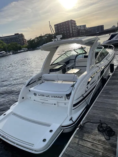 $30k Price Reduction! Yacht Photos Pics 2020 Formula 350 Sun Sport boat docked at sunset, featuring sleek design and spacious deck.