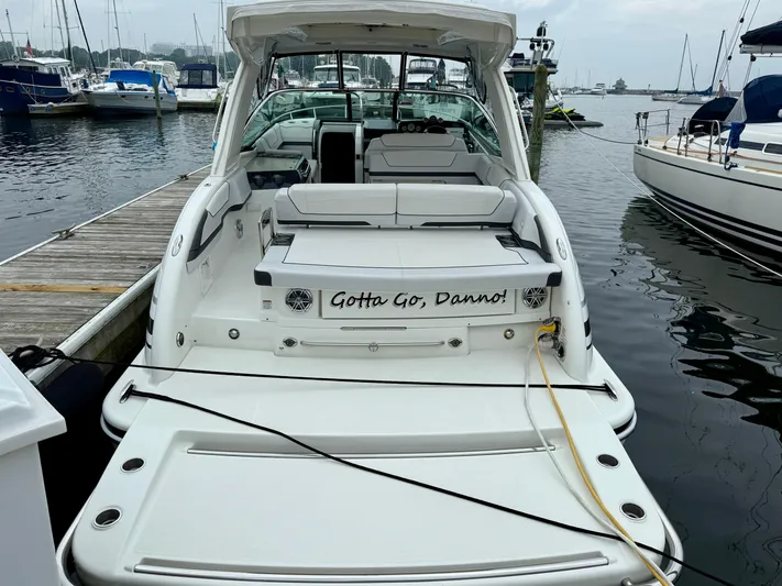 $30k Price Reduction! Yacht Photos Pics 2020 Formula 350 Sun Sport boat docked at marina, rear view.