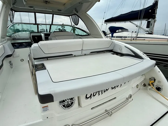 $30k Price Reduction! Yacht Photos Pics 2020 Formula 350 Sun Sport boat interior with white seating and modern design.