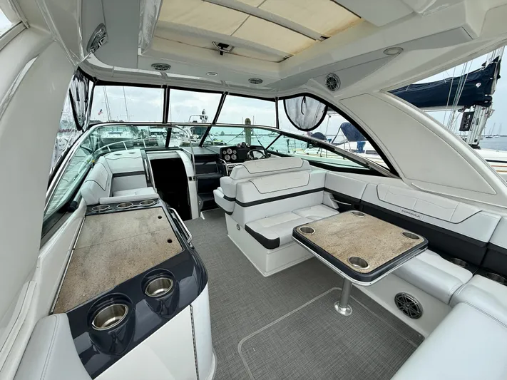 $30k Price Reduction! Yacht Photos Pics 2020 Formula 350 Sun Sport interior with luxurious seating and modern amenities.