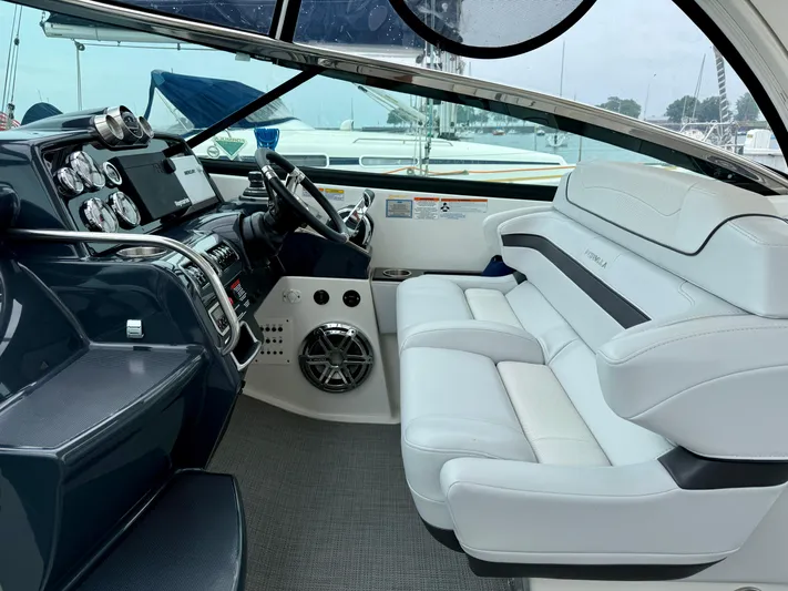 $30k Price Reduction! Yacht Photos Pics 2020 Formula 350 Sun Sport boat interior with sleek dashboard and luxurious seating.