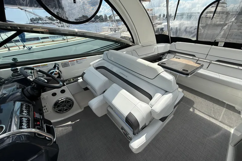 $30k Price Reduction! Yacht Photos Pics 2020 Formula 350 Sun Sport boat interior with luxurious seating and modern dashboard.