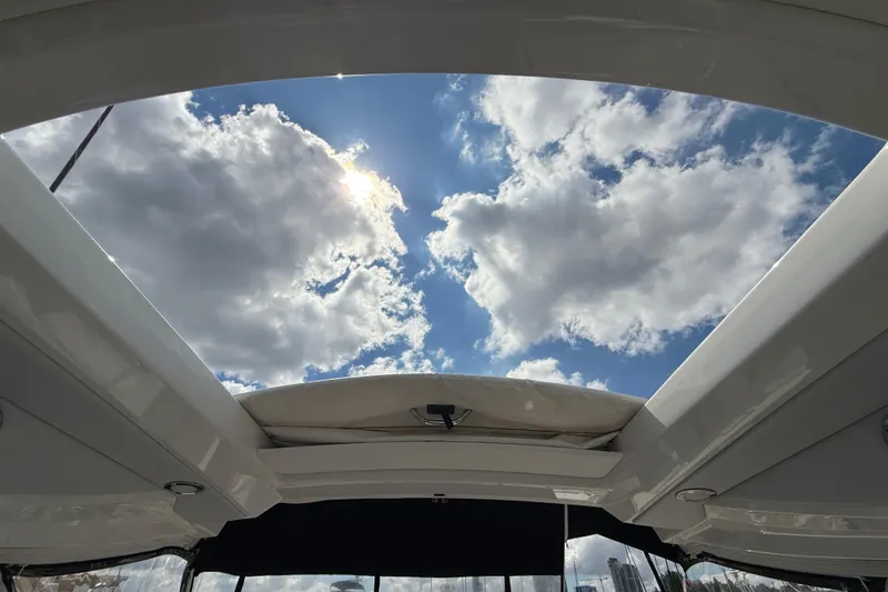 $30k Price Reduction! Yacht Photos Pics View from 2020 Formula 350 Sun Sport boat, showcasing open sky and clouds.