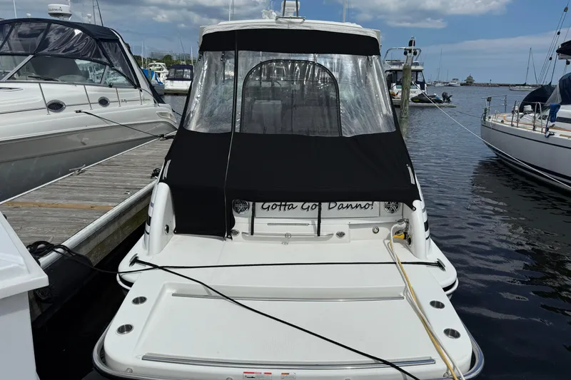 $30k Price Reduction! Yacht Photos Pics 2020 Formula 350 Sun Sport boat docked at marina, rear view with black cover.
