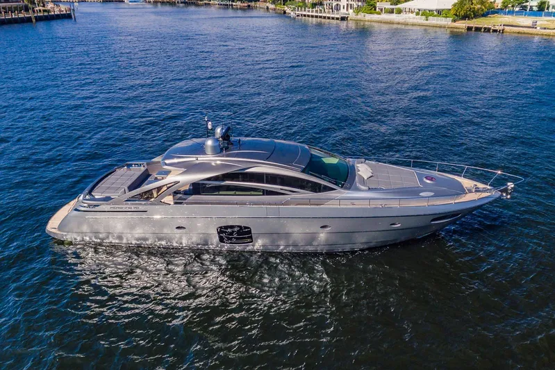 Argo Yacht Photos Pics 2017 Pershing 70 yacht cruising on open water, showcasing sleek design and luxury features.