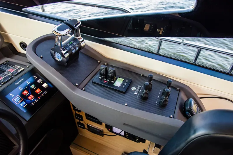 Argo Yacht Photos Pics Control panel of a 2017 Pershing 70 yacht with advanced navigation systems.
