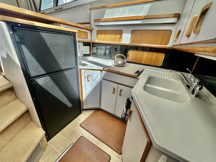 Tenacious Yacht Photos Pics Sea Ray 380 Aft Cabin yacht kitchen, 1990 model.