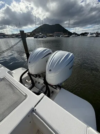 Wapala Yacht Photos Pics 2004 SeaVee 34 Center Console with twin Yamaha outboard engines docked in a marina.