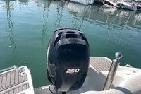 2016 Crownline Eclipse E2 XS boat with 250 Pro outboard motor at marina.