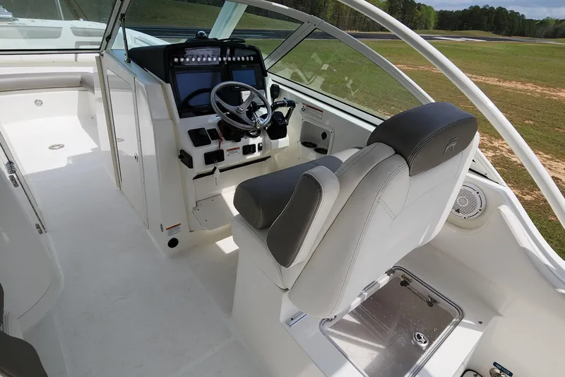  Yacht Photos Pics 2019 World Cat 296DC boat interior with modern helm and seating.