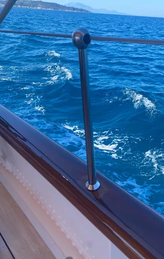 Iduna Yacht Photos Pics Classic 1939 Feadship sailing yacht railing with ocean view.