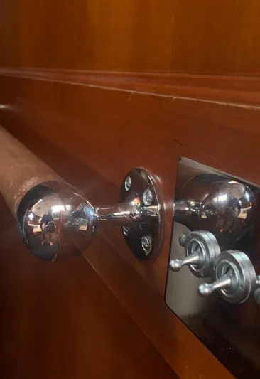 Iduna Yacht Photos Pics Close-up of 1939 Feadship Classic Sailing Yacht's polished wood and chrome interior details.
