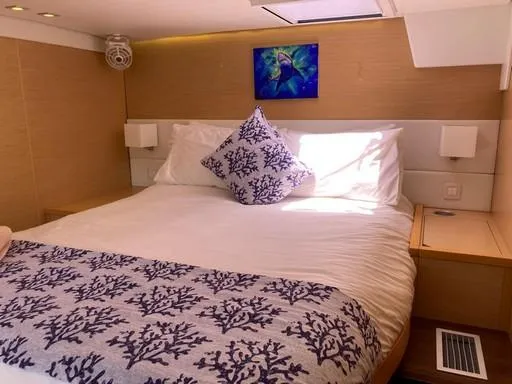 Recipe Yacht Photos Pics Luxurious bedroom interior of 2011 Lagoon 560 yacht with nautical-themed decor.