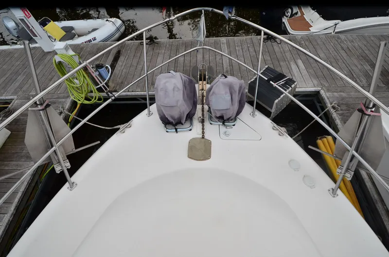 Escape Yacht Photos Pics Bow view of 2000 Sea Ray 420 Aft Cabin yacht docked at marina.