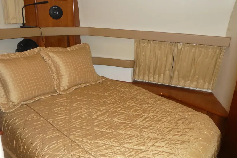  Yacht Photos Pics Luxurious cabin interior of 2006 Carver 366 Motor Yacht with elegant bedding.