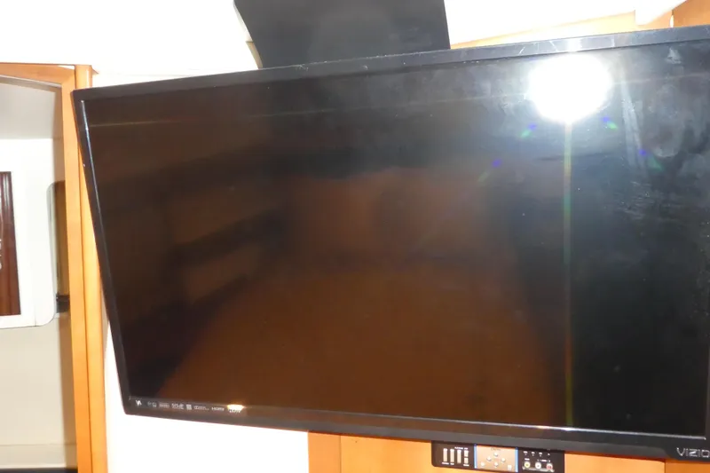  Yacht Photos Pics Flat-screen TV inside 2006 Carver 366 Motor Yacht cabin.