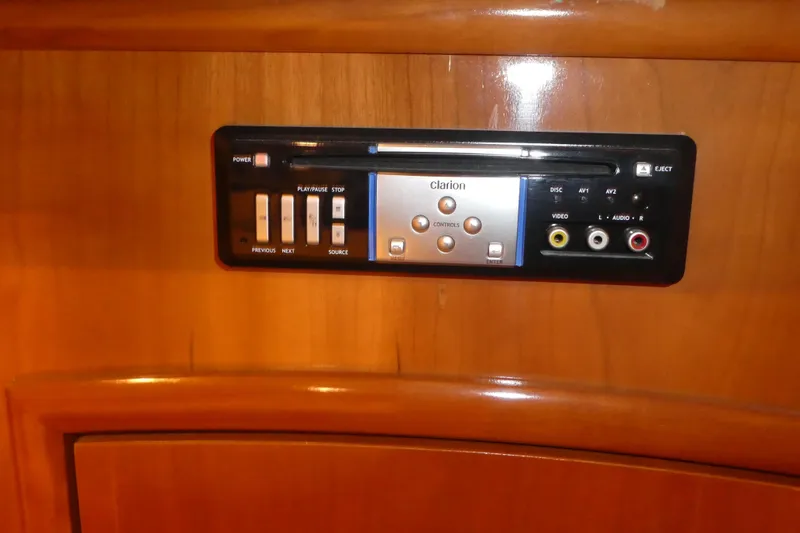  Yacht Photos Pics Clarion audio system in 2006 Carver 366 Motor Yacht, featuring control buttons and AV inputs.