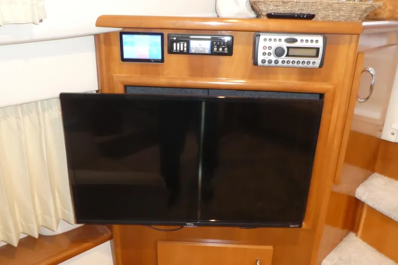  Yacht Photos Pics Entertainment system in 2006 Carver 366 Motor Yacht with TV and control panel.