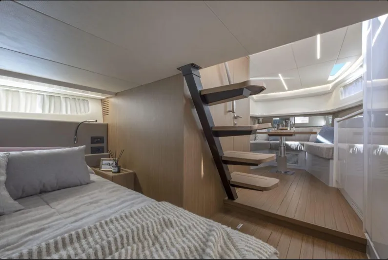  Yacht Photos Pics Luxurious interior of 2021 Bluegame BG42 yacht with modern design and cozy furnishings.