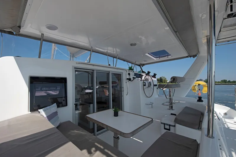 Waxy Yacht Photos Pics Spacious deck of 2021 Celtic Yachts 40 with seating and helm station.