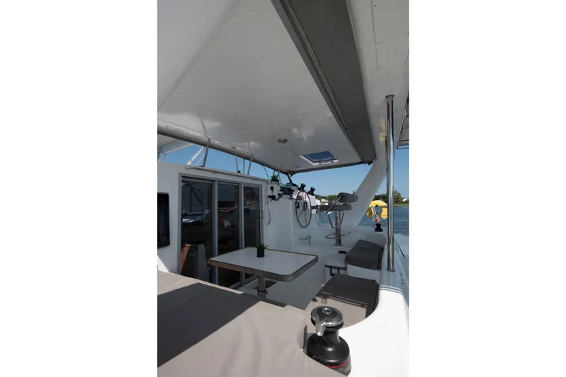 Waxy Yacht Photos Pics Spacious deck of 2021 Celtic Yachts 40, featuring seating and navigation equipment.