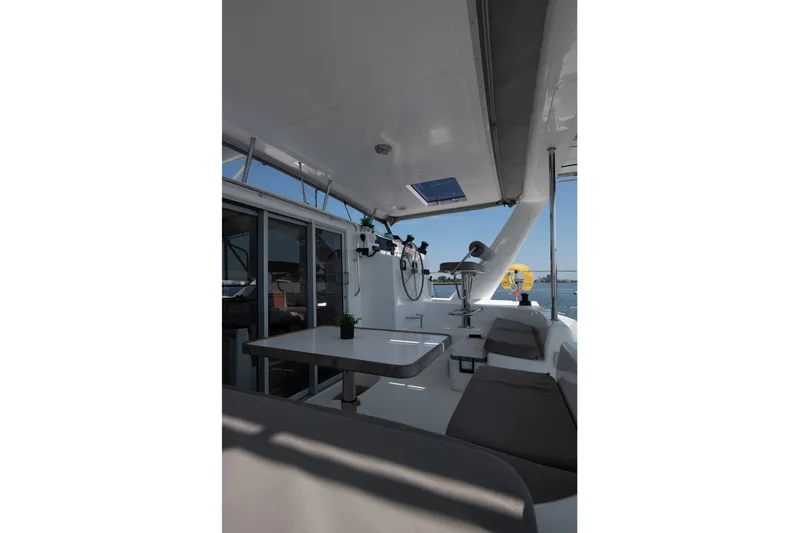 Waxy Yacht Photos Pics Modern interior of 2021 Celtic Yachts 40, featuring sleek seating and a dining area.