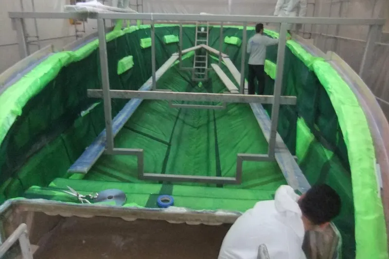 Aida 46 Sport Yacht Photos Pics Construction of AIDA YACHTS 46 SPORT, 2026 model, in progress with green protective coverings.