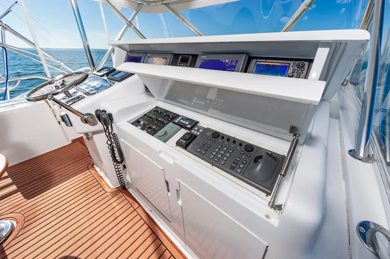 Sea Trader Yacht Photos Pics 2005 Hatteras 60 Convertible yacht helm with advanced navigation controls.